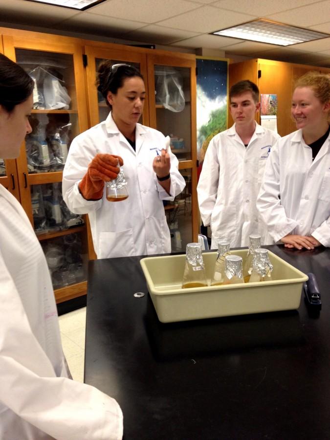 Mrs. Michelle Leonard, second from left, is the newest member of the MSMS Biology and Chemistry departments. The former Columbus High teacher demonstrates media preparation to Hannah Hardwick, from left, Connor McNamee and Lauren Scott.
