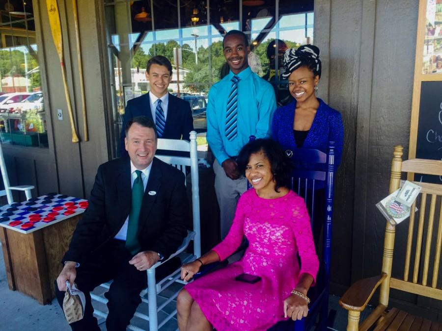 Jasmine King, in blue, posing along with with Judge Kitchens, seated, and other members of the MSMS Mentorship Program