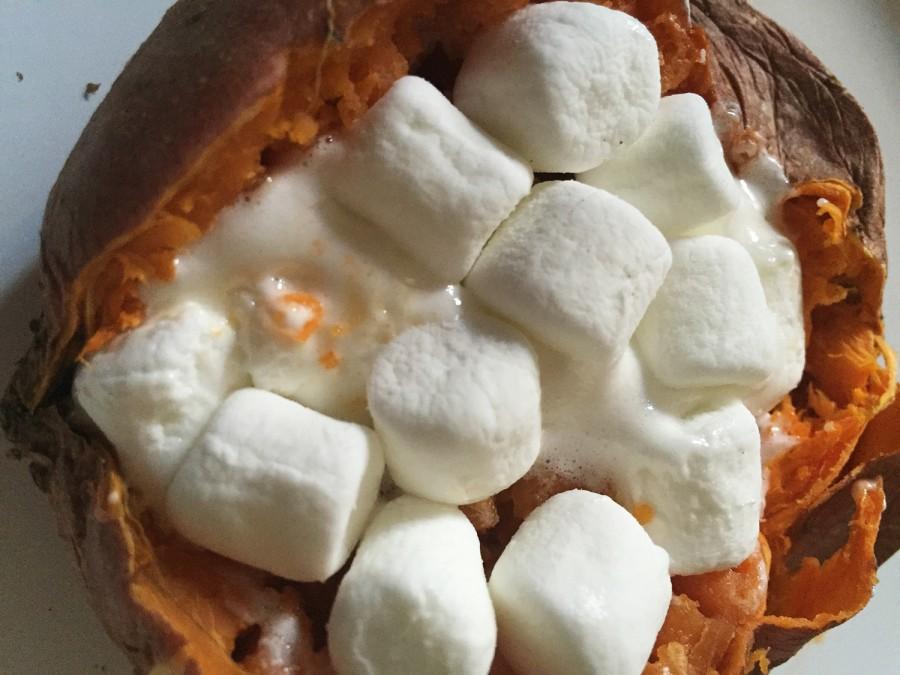 A sweet potato with marshmallows. Sweet potatoes are extremely high in nutrients and are only a little over 100 calories. Feel free to eat two. 