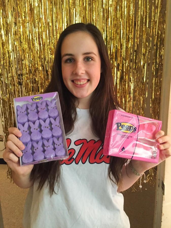 Senior Liz Lanford with Easter-themed gifts from her secret pal. 