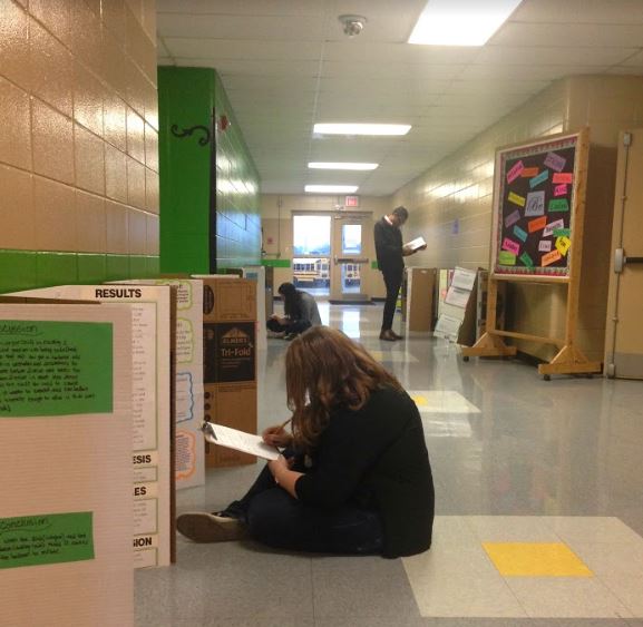 MSMS Students judge the Science Fair projects at New Hope Elementary. 