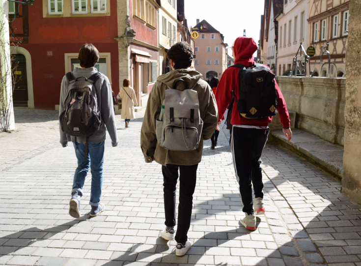 Dustin Dunaway, Caleb Eubanks and Tanner Miley explore a German street.
