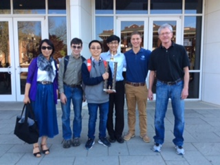 MSMS chess team poses with sponsor, Dr. Curtis.