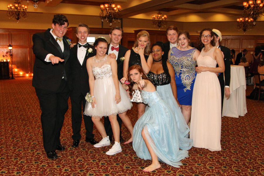 A group of MSMS students and their dates pose near the dance floor at Lion Hills Center.