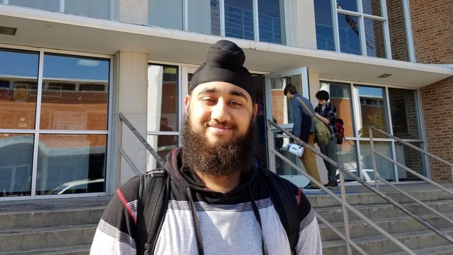 Harpreet Singh puts on a bright smile before heading off to afternoon classes.