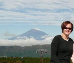 Ms. Heintz poses for a memorable shot in front of Mt. Fuji.