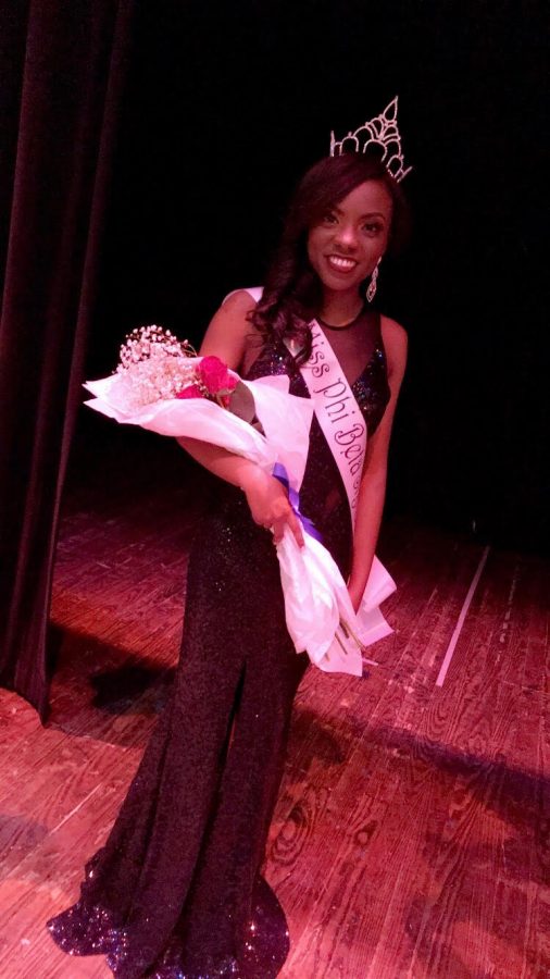 Miraculas Clemons poses after winning the title of Miss Phi Beta Sigma 