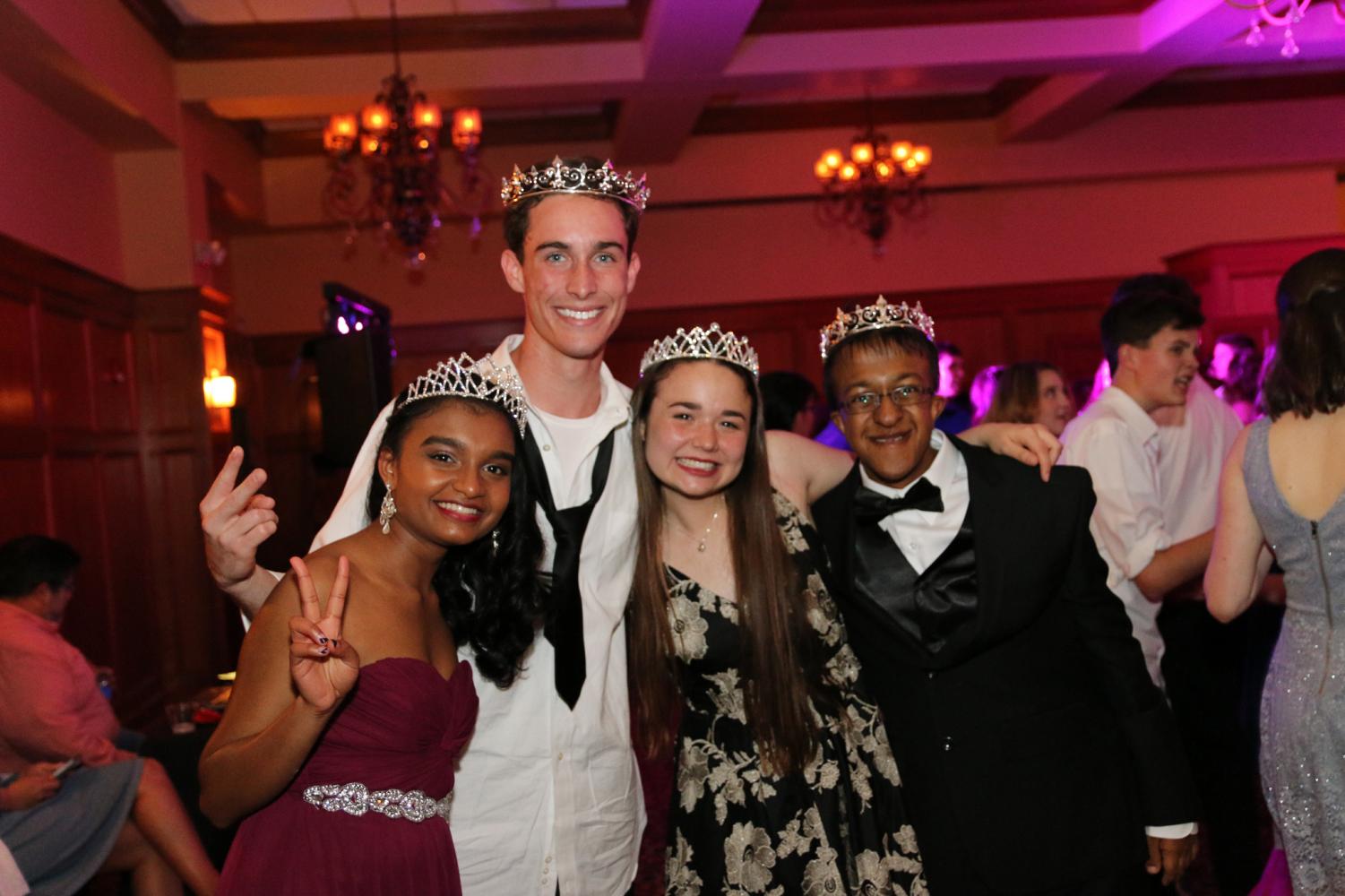 Newly elected prom royalty beam for a picture. (From left to right: Mariat Thankachan, David Thaggard, Madison Wypyski, Dev Jaiswal)