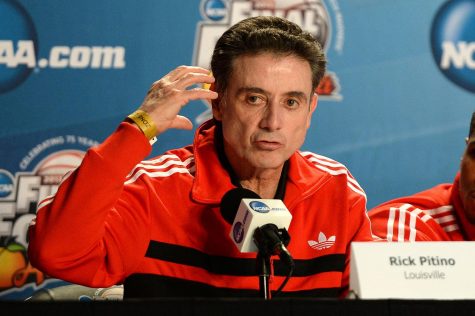Former University of Louisville Mens Basketball head coach Rick Pitino addressing the media during the Final Four of his 2013 NCAA Championship season that eventually had to be vacated due to a recruiting and sex scandal involving the team and Pitino.