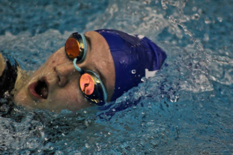 Andie Nanny powers through on the relay after a mishap with her goggles slipping earlier in the meet.