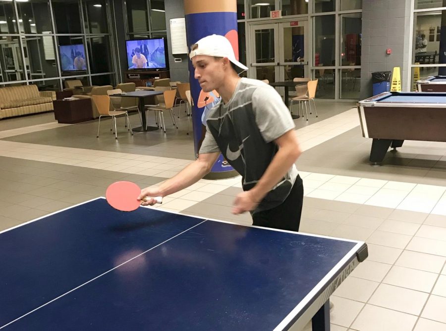 RA Jon Beadlescomb anticipates the approaching ping-pong ball.