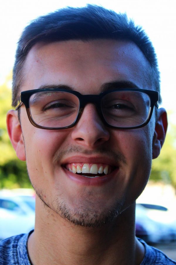 Cross Country Co-Captain Michael Payne smiles for the camera.