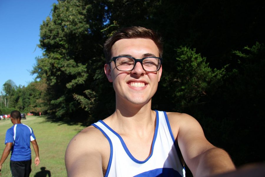 Michael Payne beams in excitement before running a meet.