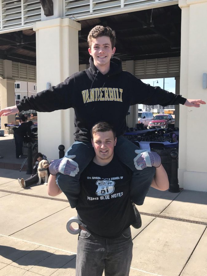 Cade Burton and Will Sutton have some fun to distract themselves from the cold.