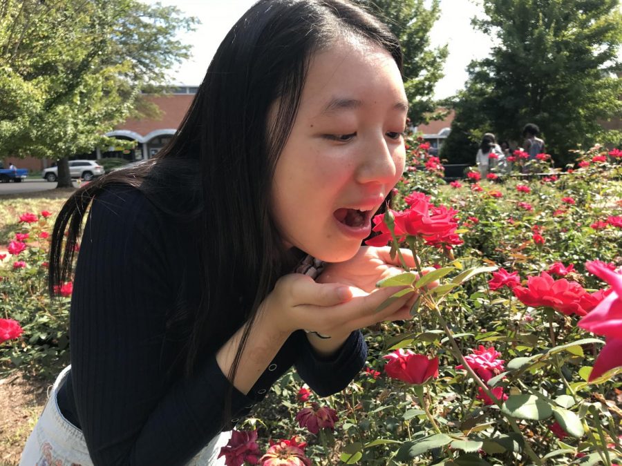I realized as I was uploading this that I failed to take a feature photo, so enjoy this picture of me eating a flower?