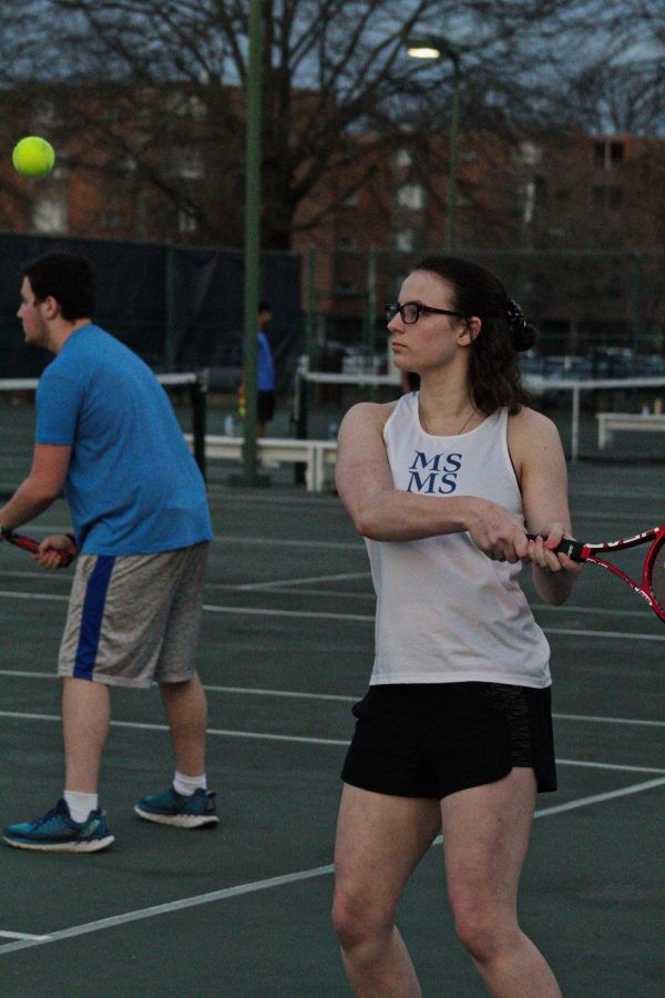 Victoria Meyers swings back in double's matches.