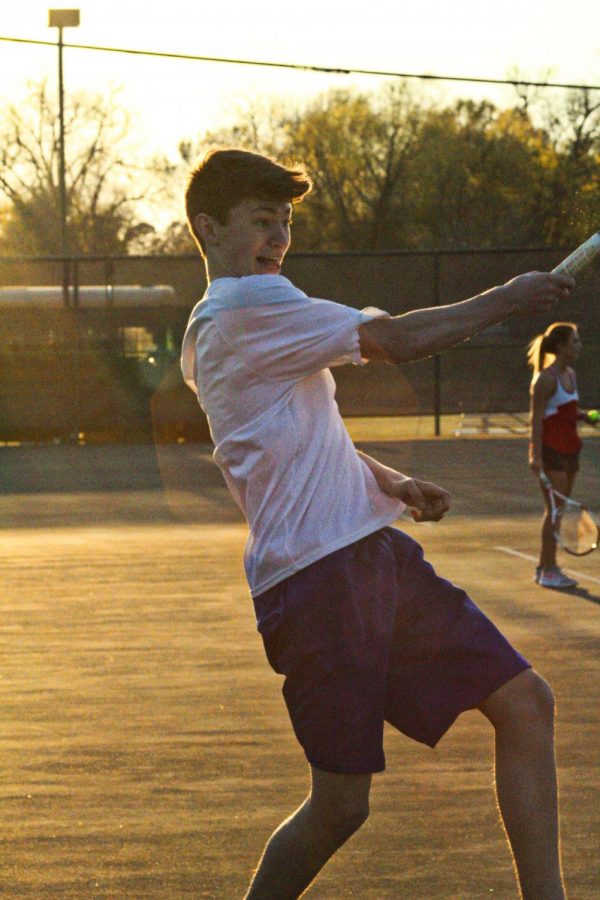 William Boatner Calhoun plays in the last doubles match of the night.