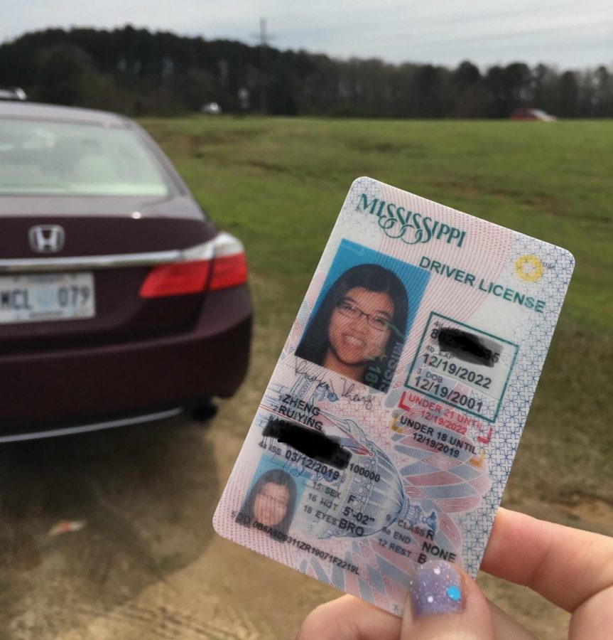 Rachel Zheng flaunts her newly earned drivers license.