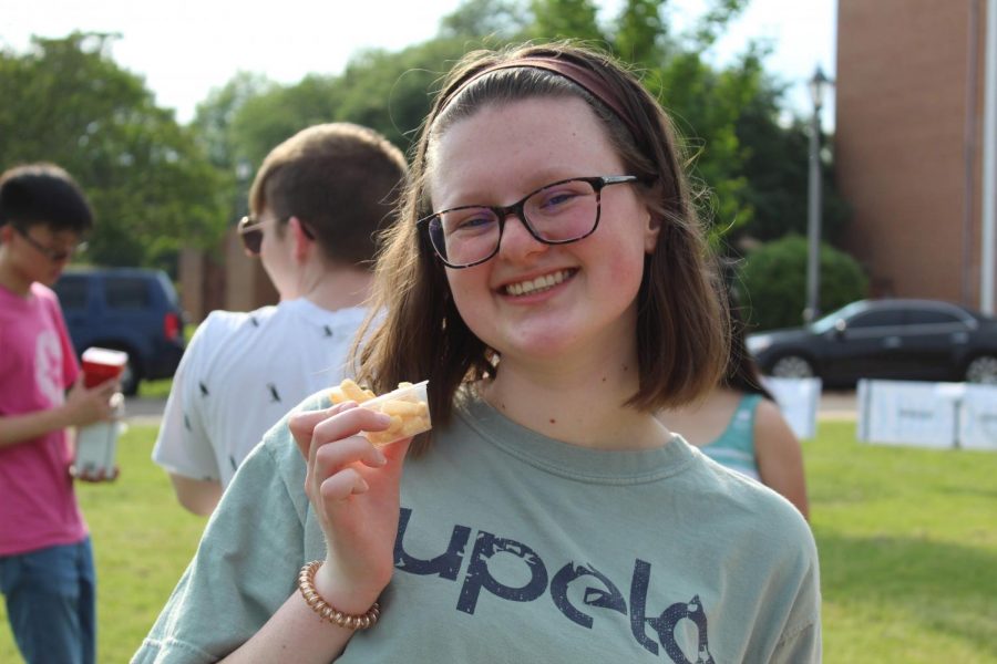 Victoria Waller enjoys her shrimp chips.