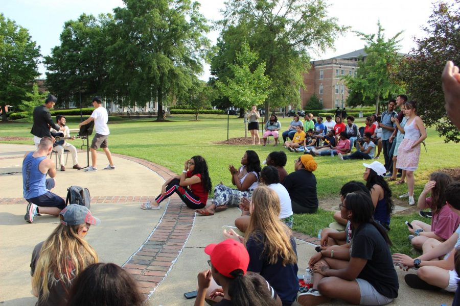 Crowds gather as the lineup of performances begin.