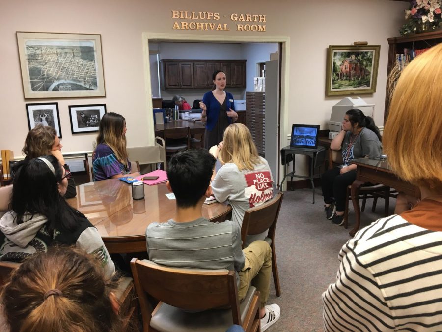 Students sitting in library orientation to prepare for this semesters Tales research.