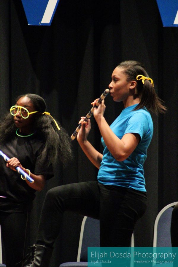 Seniors Niyah Troup and Mykailla Foster step with their canes.