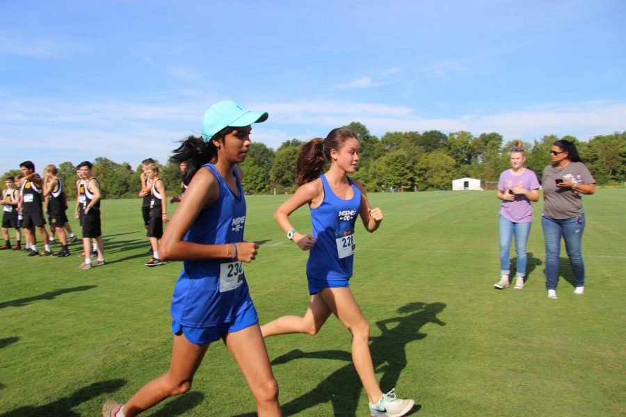 Arnoldus (right) challenges herself in all aspects of her life.