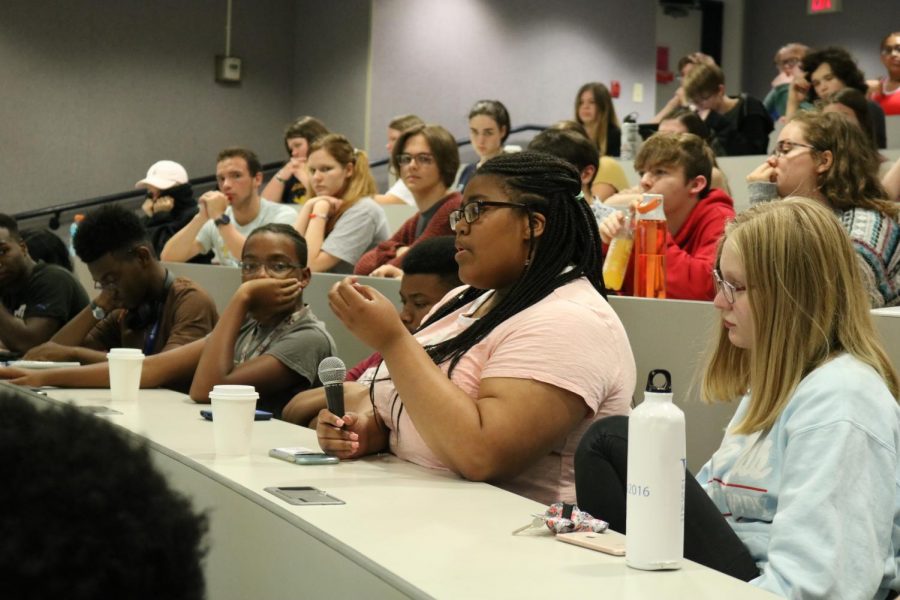 Junior Meghan Curry expresses her opinions and ideas during the discussion.