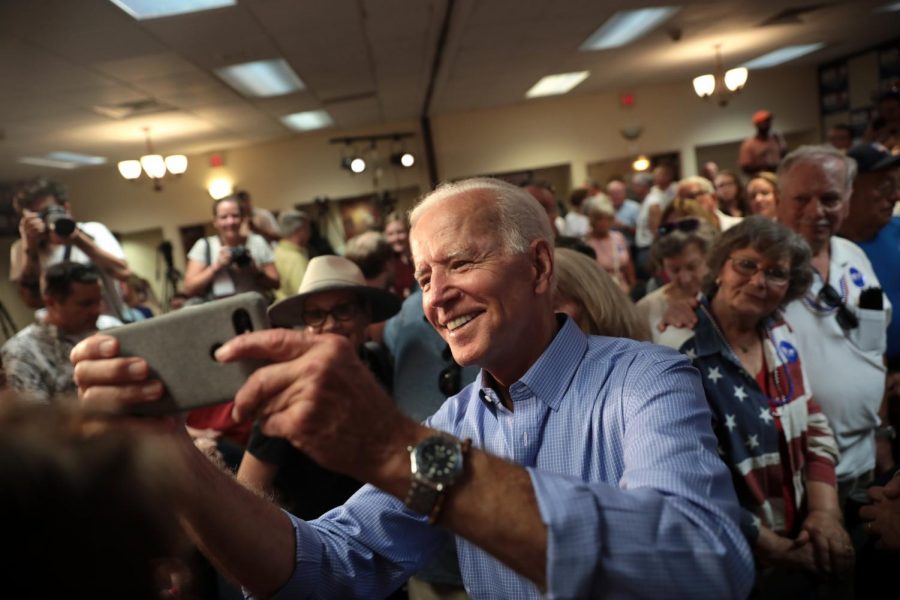 Democratic presidential candidate Joe Biden meets with his supporters at a campaign rally.