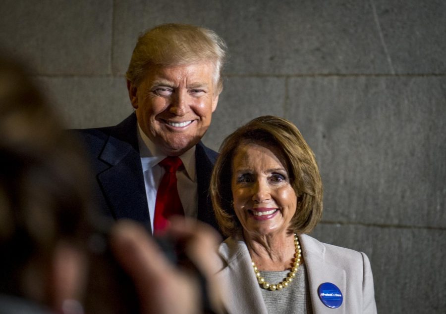 President Donald Trump pictured with Speaker of the House Nancy Pelosi