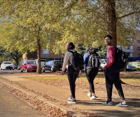 Students walk toward the dorms after classes. Pictured are (from left to right) juniors Rhianna Drake, Munjyot Singh and Sai Narla.