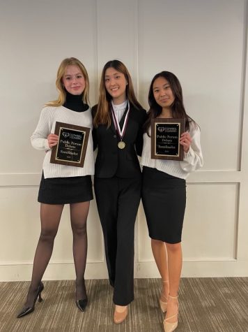 Speech and Debate compeitiors (from left to right) junior Mariane Powell, senior Christina Zhang and junor Lucianna Marquez  pose with awards after competition. 