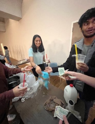 ASA Officers work to serve boba for students in attendance.