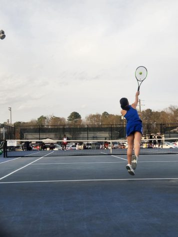 MSMS junior Iris Xue hits a shot during a tennis match Feb. 22 against Heritage Academy. The Blue Waves lost 5-2 to Starkville High School on Feb. 23, which featured straight-set victories for both MSMS doubles ones teams. 