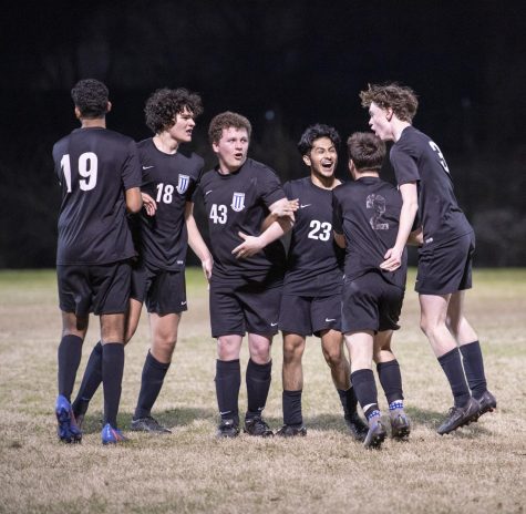 Seniors Sahib Gill, Nicholas Popescu, Isaac Riggins, Jeremy Padilla, Sawyer Levenson and Jeremy Dawe celebrate during their soccer match against Booneville on Jan. 16. Many students at MSMS have to strike a balance between their academic and athletic activities. 