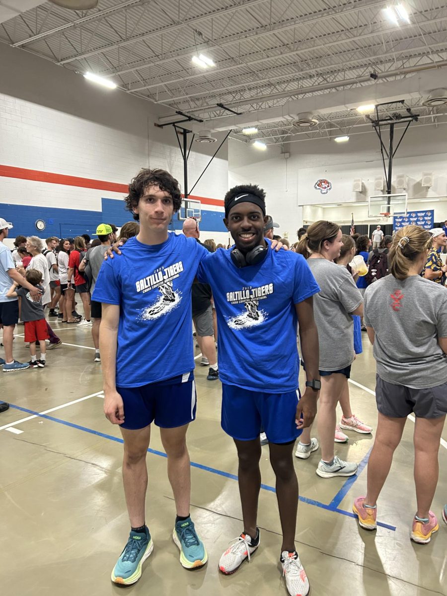 Seniors Gavin Weinstein (left) and Dylan Wiley pose at the Saltillo Invitational on Sept. 16. Weinstein placed eighth and Wiley placed 15th in the 5K.