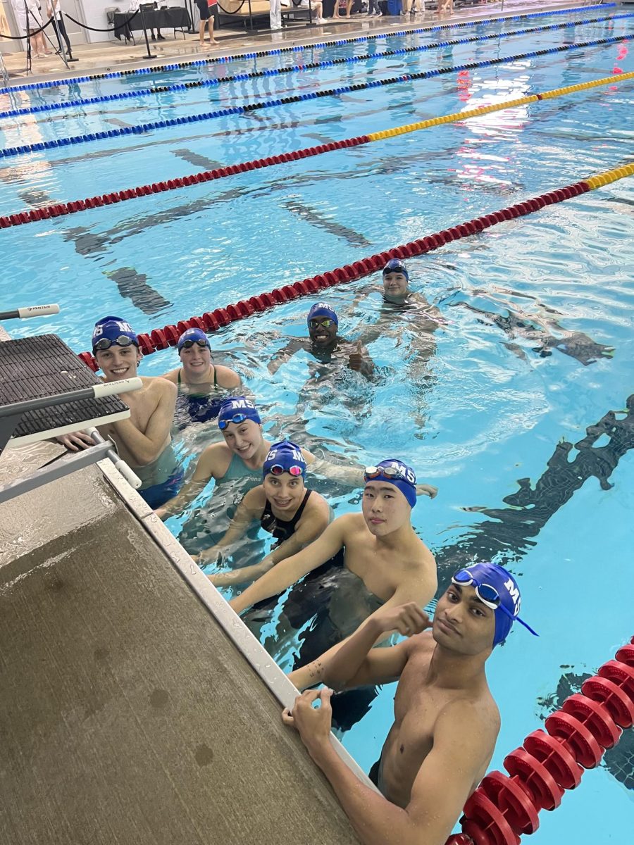 The MSMS Frazer and Goen swim teams pose in the pool at Tupelo Aquatic Center. The swim team set a new school record by earning two individual and two relay team medals at the Oct. 21 Class I MHSAA Swim Championships.