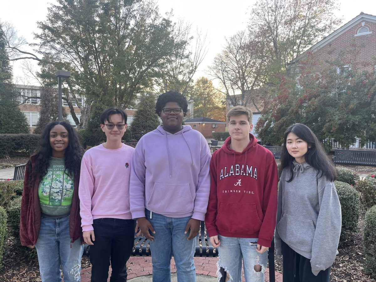 From left to right, Junior Class Historian Jaidyn Bryant, Treasurer Andy Chen, President Maurice Hunter, Secretary Cratin Quinnelly and Vice President Yaerim Choi pose together in Mary Wilson Garden. The Class of 2025 elected its officers on Sept. 21 in close competitions.