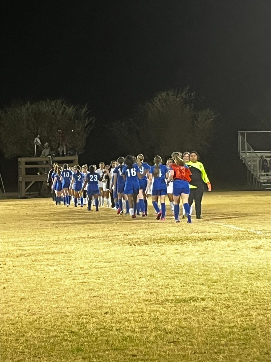 Goen players shake hands with Vardaman players after a 7-3 loss. 