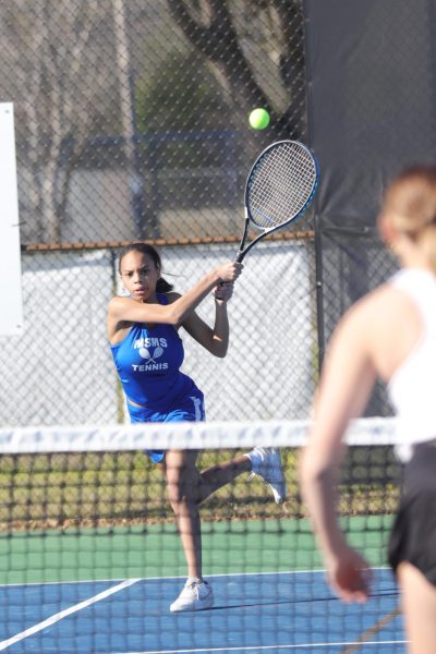 Senior Sydney Beane returns a shot in her doubles match against Eupora High School on March 19. The MSMS tennis team won its first district match 5-2 against French Camp on March 4 before beating Eupora 5-2.