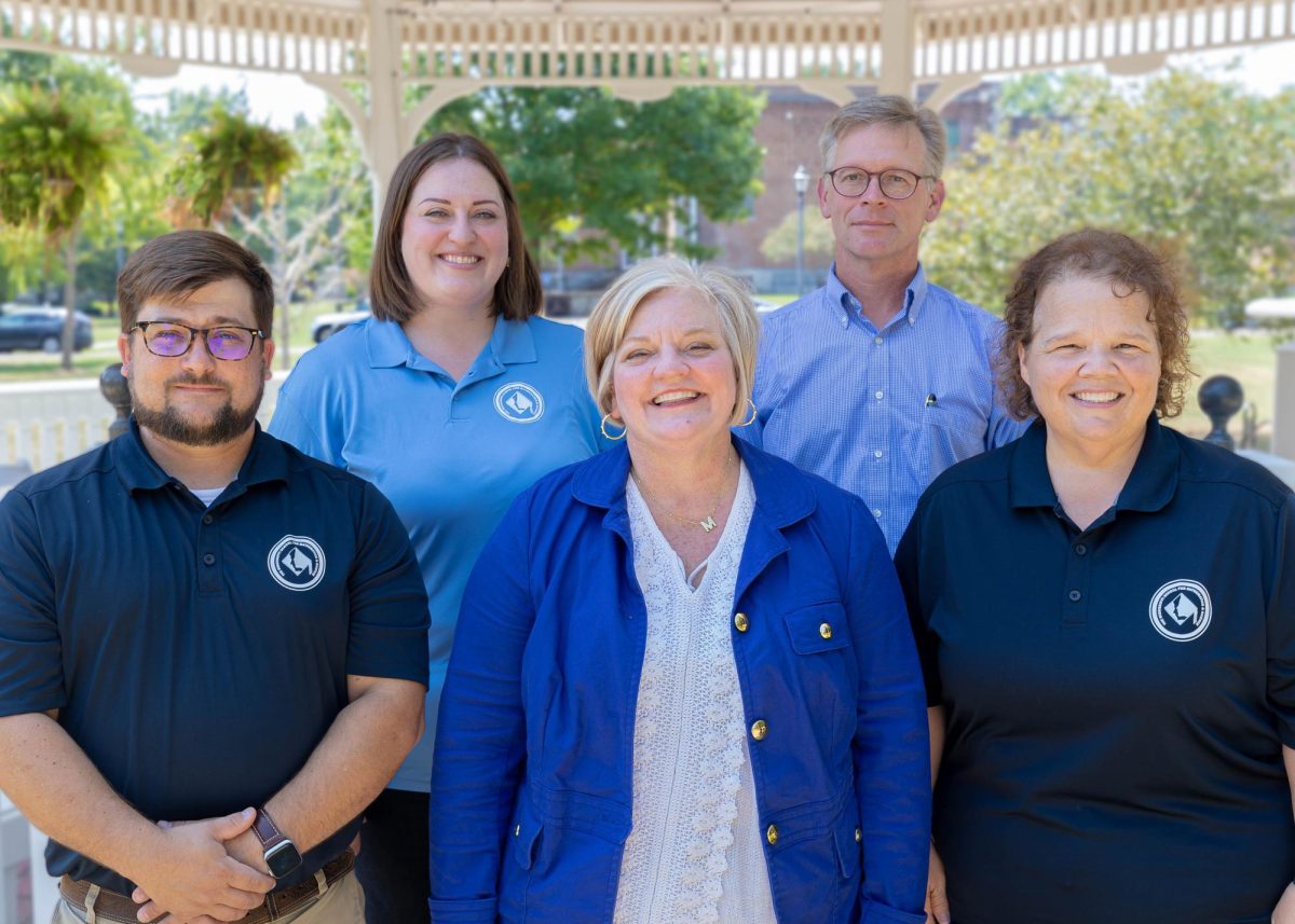 MSMS Administration Directors poses in front of the MUW pavilion. Pictured from left to right (top row) are Director of Student Affairs Stacey Holmes and Director of Academic Affairs Thomas Easterling; (bottom row) Director for Operations Matt Fondren, Director for Advancement Melanie Busby and Executive Director Ginger Tedder. 