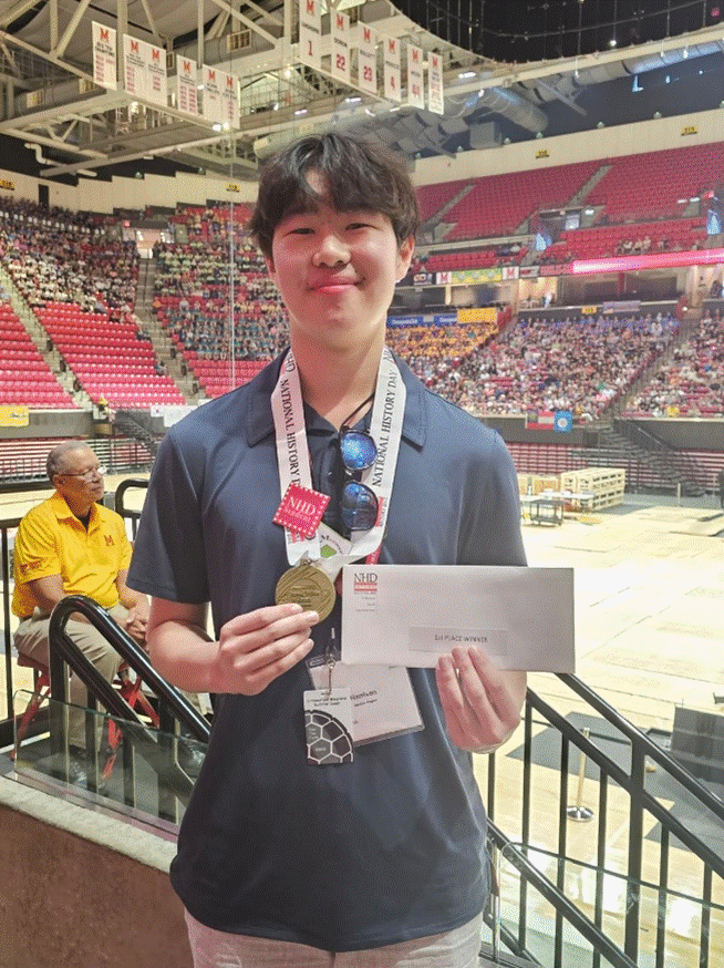 Senior Harrison Shao poses after winning first place at the 2024 National History Day competition in College Park, Maryland.
