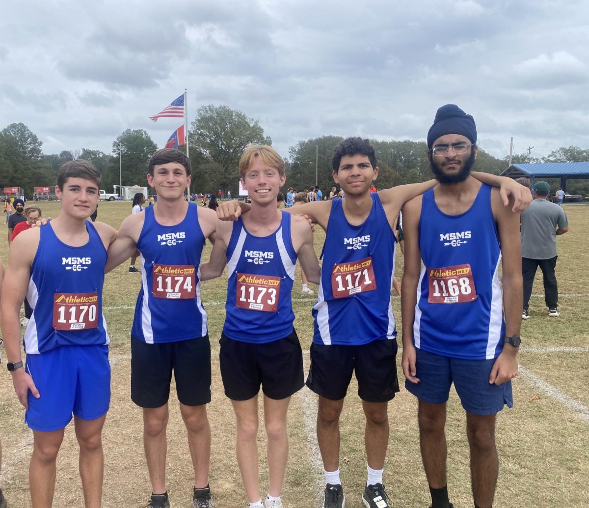 From left to right: Lucas Griffith, Jonathan Stancill, Lucas Sloan, Nolan Clark and Jasmaan Banipal pose at the state cross-country meet in Clinton on Oct. 31.