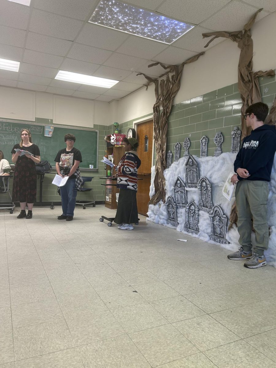 From left to right: senior Naomi Simpson and juniors Evan Burgoyne, Althea Wells and John Broome rehearse for their upcoming musical.