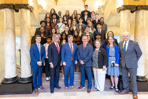 Mississippi Gov. Tate Reeves, third from left, poses with MSMS students, teachers and administrators at the Mississippi State Capitol on Jan. 29. 