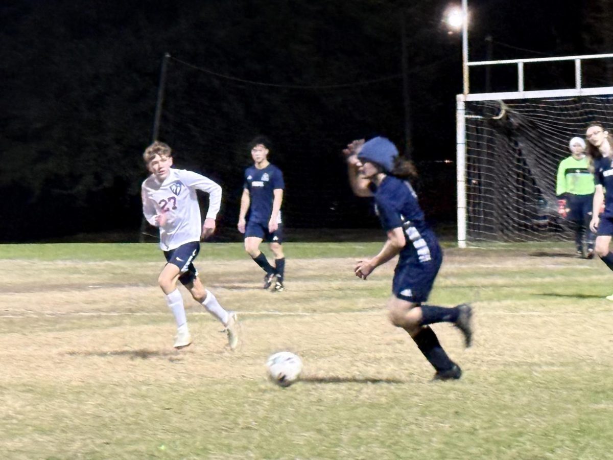 Senior Acyn Harrell advances the ball on Friday against Tuplelo Christian Preparatory School.