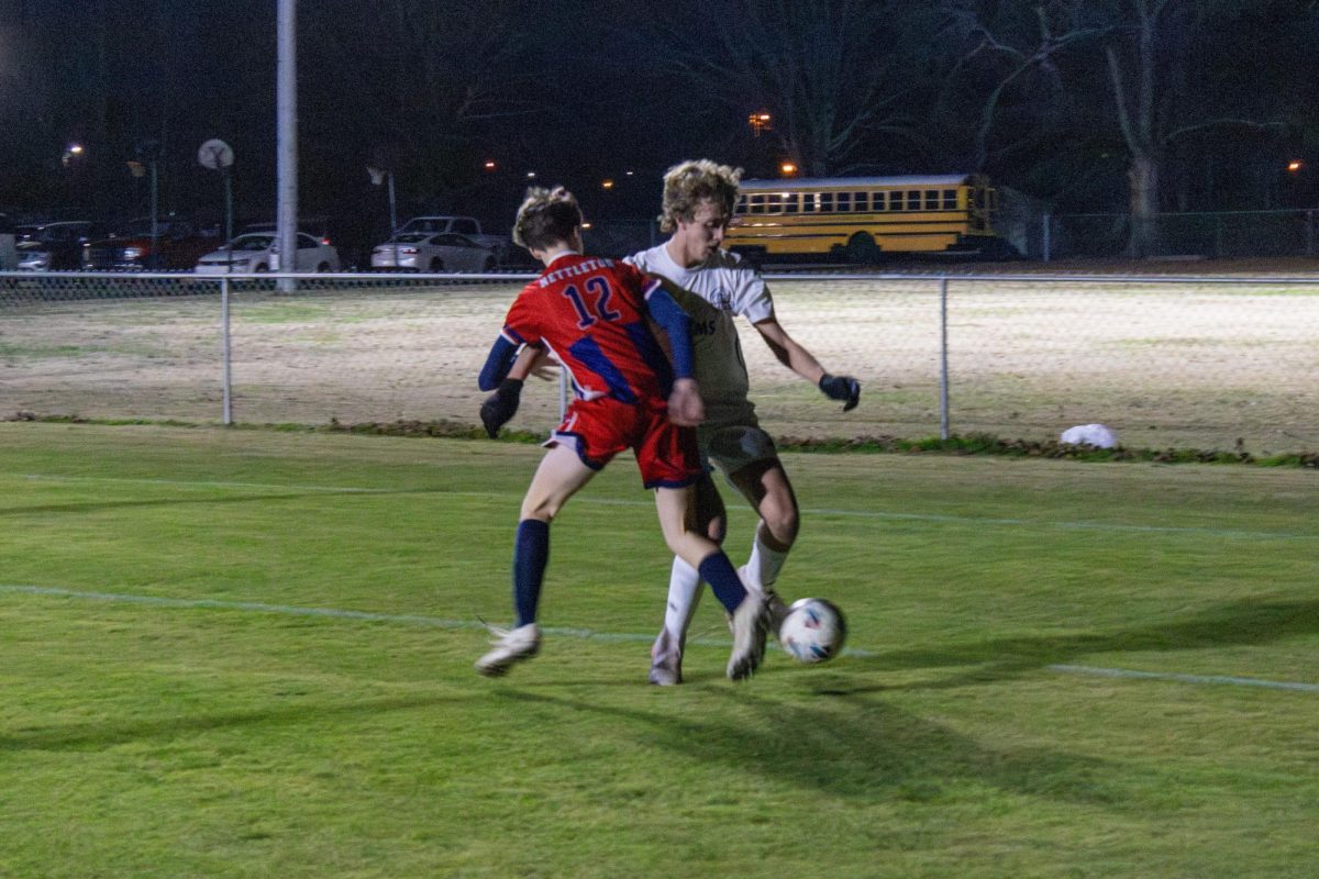 Junior Hutch Clemons dribbles past a Nettleton player on Jan. 13. 