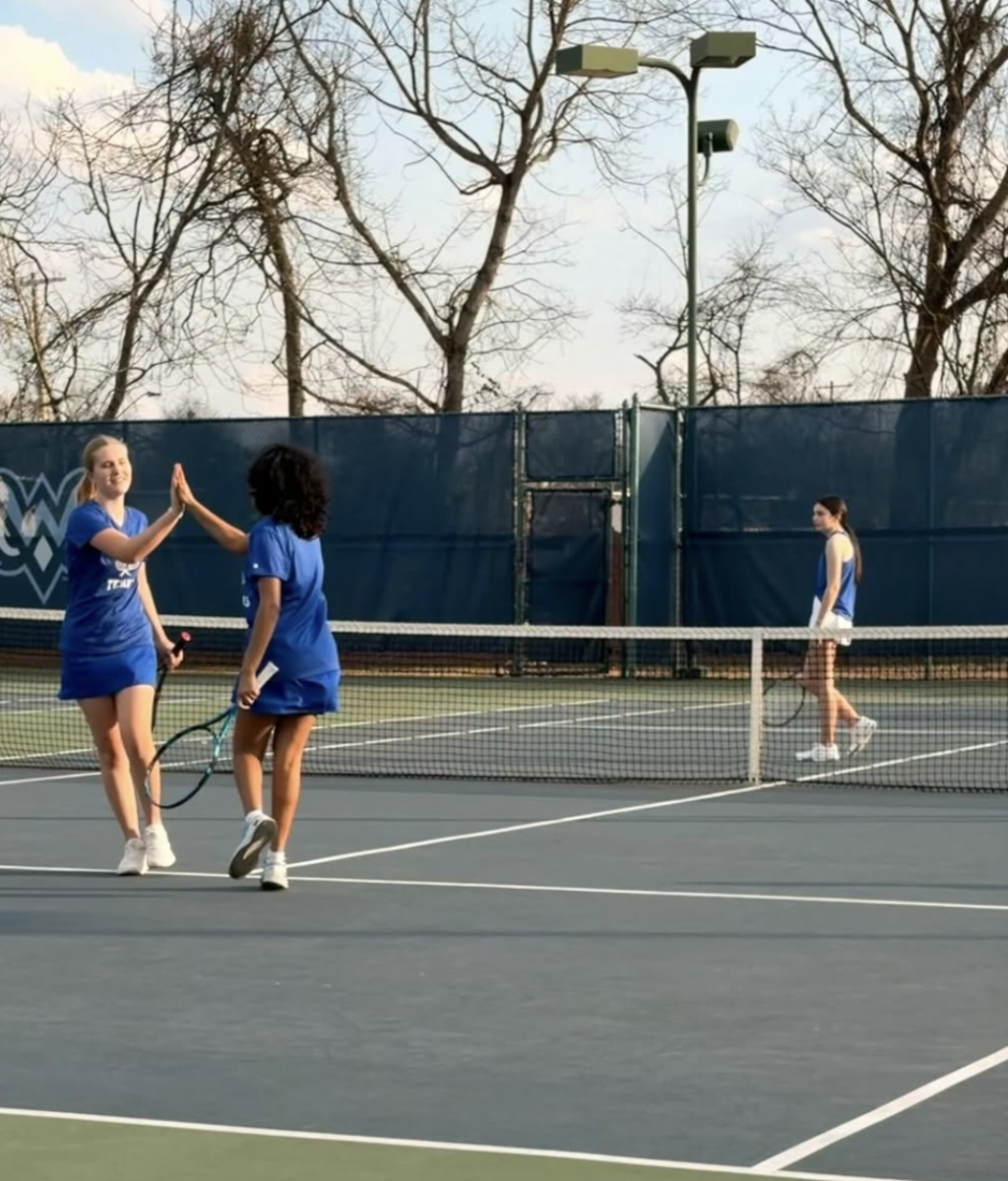 Juniors Cecelia Buehler and Avanthi Remata play a doubles match against Starkville Academy on Feb. 19.