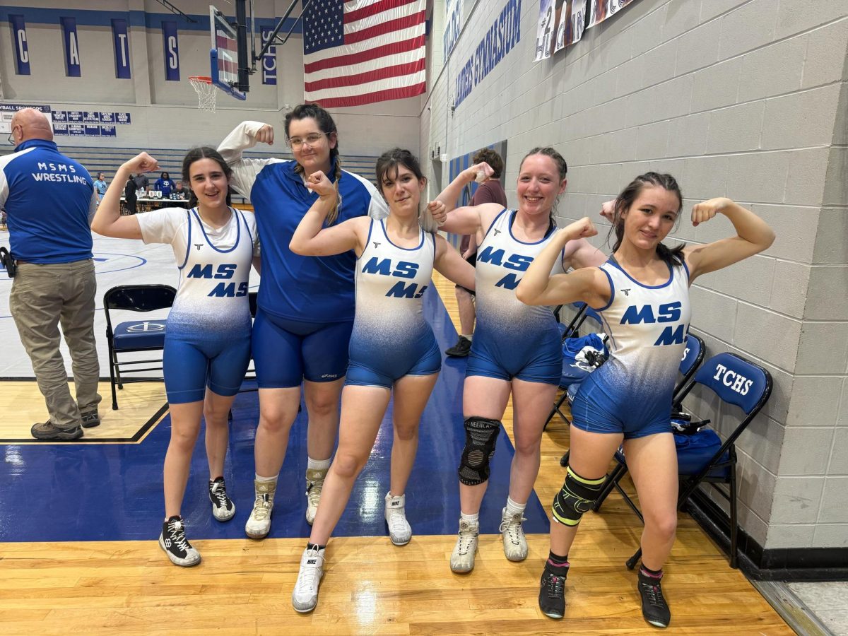 Goen wrestlers pose at a meet at Tuscaloosa County High School on Jan. 14. From left: juniors Alissa Hull, Kyra Means, and Harper Hipp, and seniors Nina Weinstein and Annabelle Banda.
